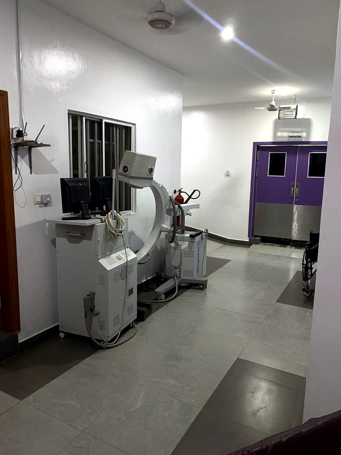 Mobile image intensifier and its viewing monitors in the corridor outside the theatre doors at Banby Specialist Hospital in Ibadan